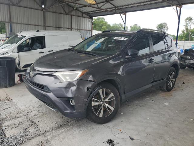 TOYOTA RAV4 XLE 2017 with VIN JTMWFREV1HJ705428 - Photo from auction