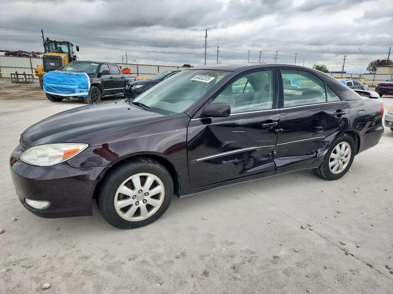 TOYOTA CAMRY LE 2004 with VIN 4T1BF32K64U581957 - Photo from auction