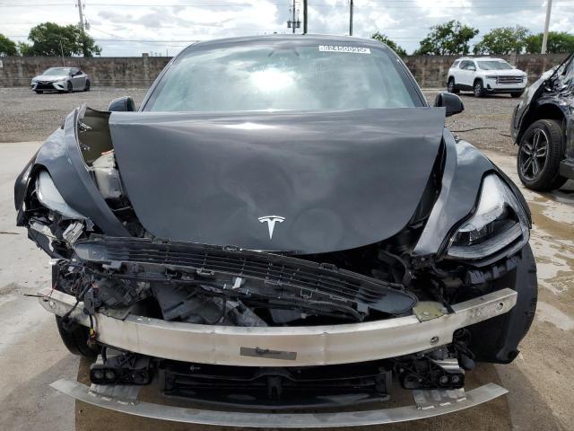 Photo 5 from auction – 2022 TESLA MODEL 3 with VIN 5YJ3E1EAXNF288429