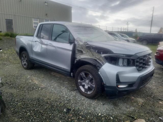 Photo 4 from auction – 2024 HONDA RIDGELINE with VIN 5FPYK3F66RB501068