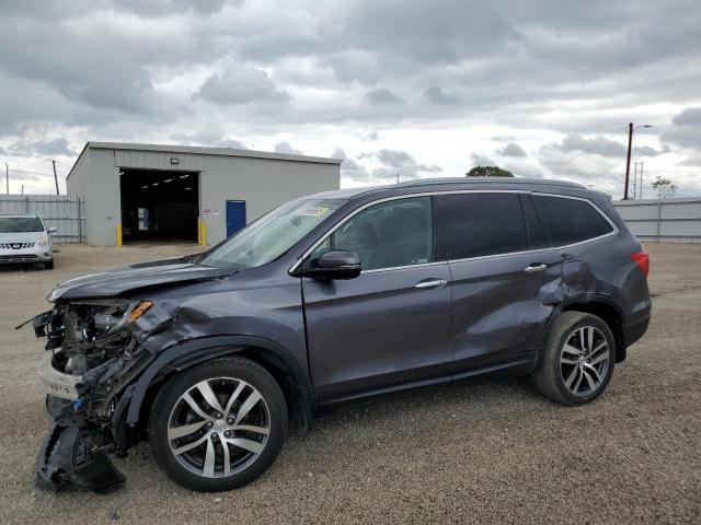HONDA PILOT ELIT 2018 with VIN 5FNYF6H09JB013454 - Photo from auction