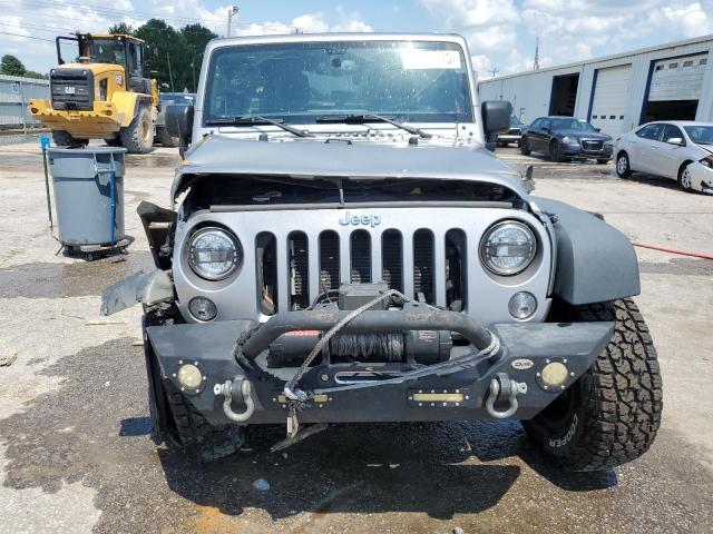 Photo 5 from auction – 2015 JEEP WRANGLER U with VIN 1C4BJWFG7FL515341
