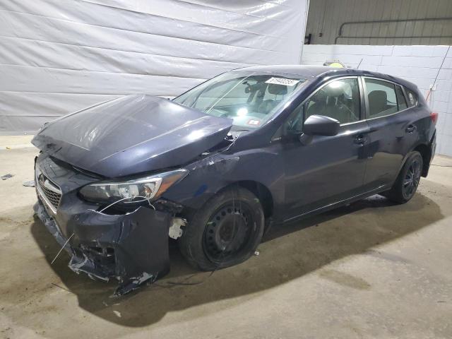 SUBARU IMPREZA 2019 with VIN 4S3GTAA62K3750029 - Photo from auction