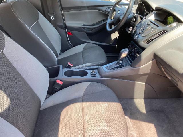 Photo 5 from auction – 2014 FORD FOCUS S with VIN 1FADP3E23EL323253