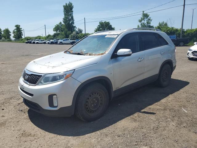 KIA SORENTO LX 2015 with VIN 5XYKTCA69FG615184 - Photo from auction