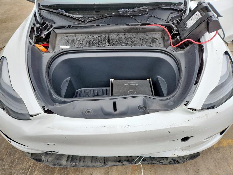 Photo 11 from auction – 2023 TESLA MODEL Y with VIN 7SAYGAEE6PF802463