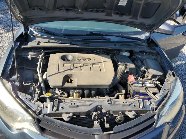 Photo 11 from auction – 2014 TOYOTA COROLLA L with VIN 5YFBURHEXEP039953