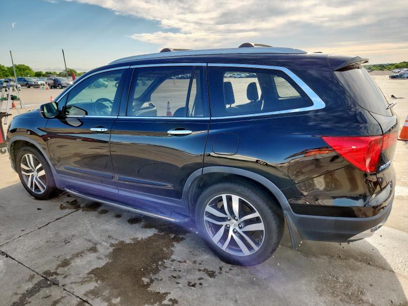 Photo 2 from auction – 2016 HONDA PILOT TOUR with VIN 5FNYF5H99GB025718