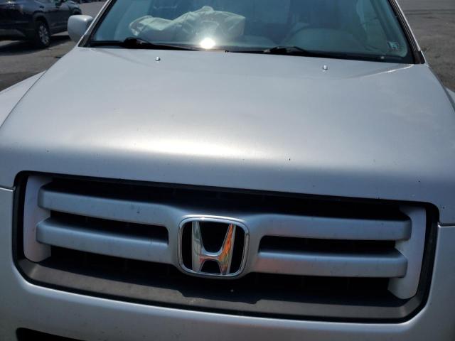 Photo 11 from auction – 2006 HONDA PILOT EX with VIN 2HKYF18436H564588