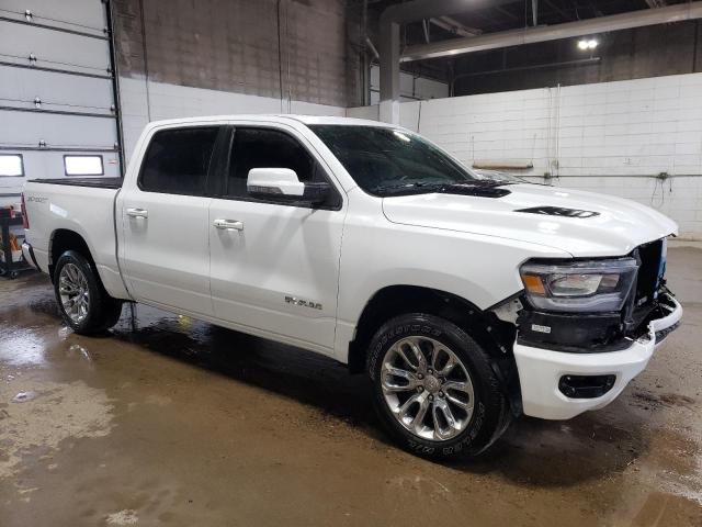 Photo 4 from auction – 2023 RAM 1500 LARAM with VIN 1C6SRFJT8PN636423