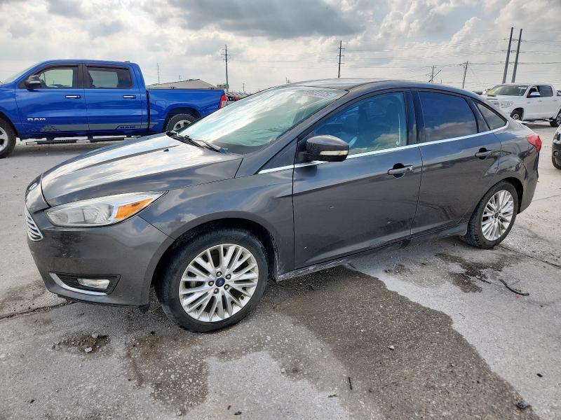 FORD FOCUS TITA 2015 with VIN 1FADP3J29FL232270 - Photo from auction