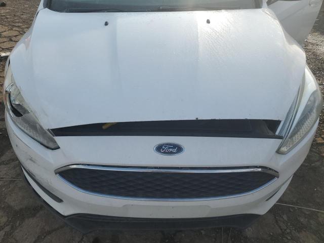 Photo 11 from auction – 2015 FORD FOCUS SE with VIN 1FADP3K24FL309142
