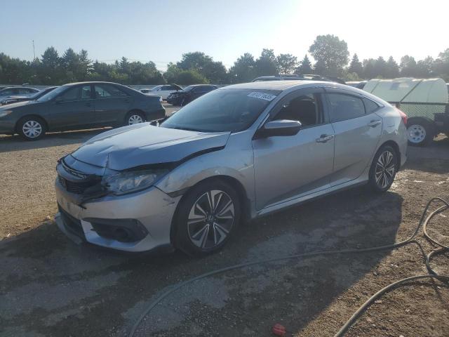 HONDA CIVIC EXL 2017 with VIN 19XFC1F75HE001191 - Photo from auction