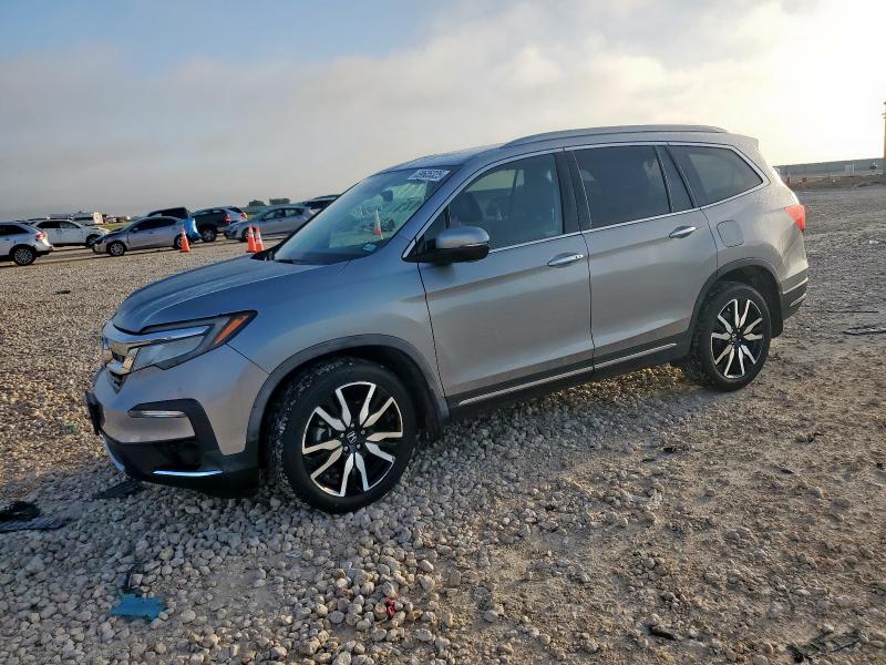 HONDA PILOT ELIT 2019 with VIN 5FNYF6H08KB001006 - Photo from auction