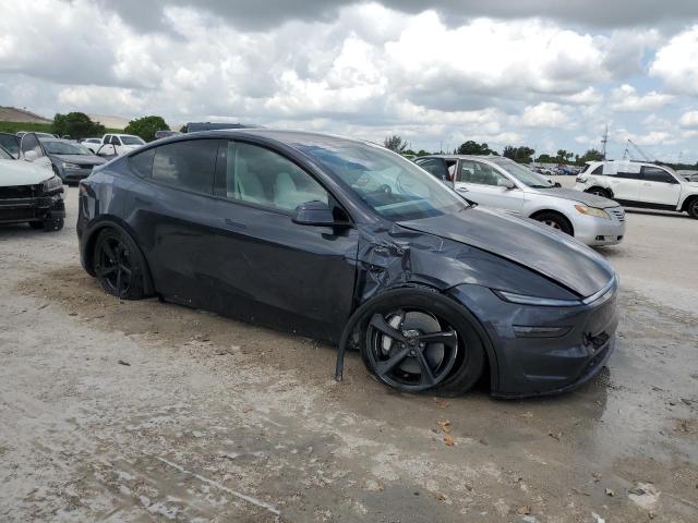 Photo 4 from auction – 2026 TESLA MODEL Y with VIN 7SAYGDEE6TA388934