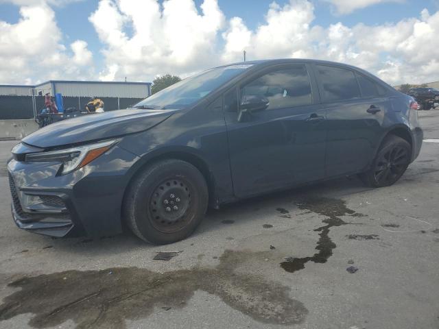 TOYOTA COROLLA SE 2023 with VIN 5YFP4MCE6PP140801 - Photo from auction