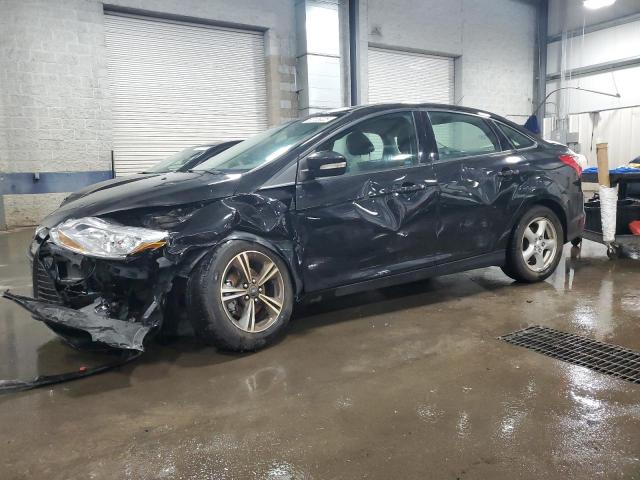 FORD FOCUS SE 2014 with VIN 1FADP3F20EL217003 - Photo from auction