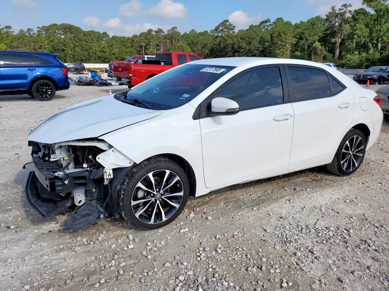 TOYOTA COROLLA L 2019 with VIN 5YFBURHE9KP911972 - Photo from auction