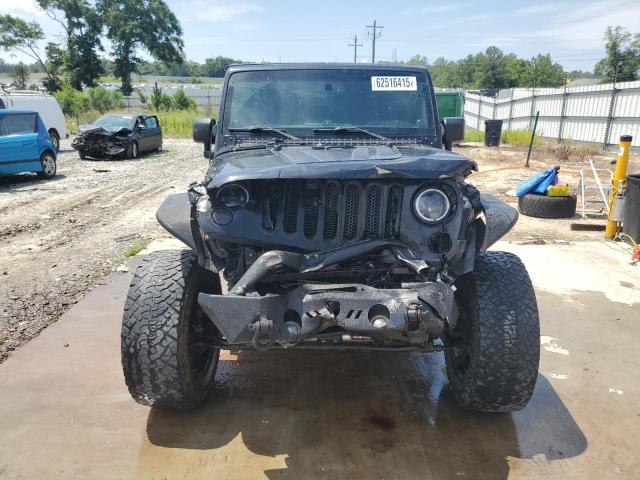 Photo 5 from auction – 2014 JEEP WRANGLER U with VIN 1C4BJWDG8EL307079