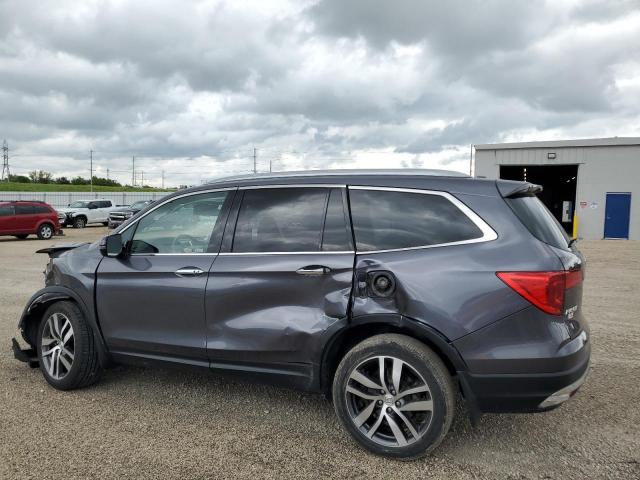 Photo 2 from auction – 2018 HONDA PILOT ELIT with VIN 5FNYF6H09JB013454