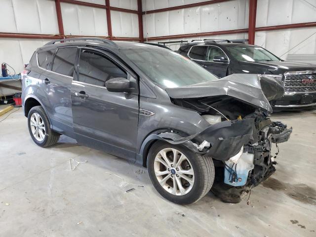 Photo 4 from auction – 2018 FORD ESCAPE SE with VIN 1FMCU0GD7JUA80185