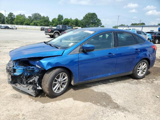 FORD FOCUS SE 2018 with VIN 1FADP3FE8JL229100 - Photo from auction