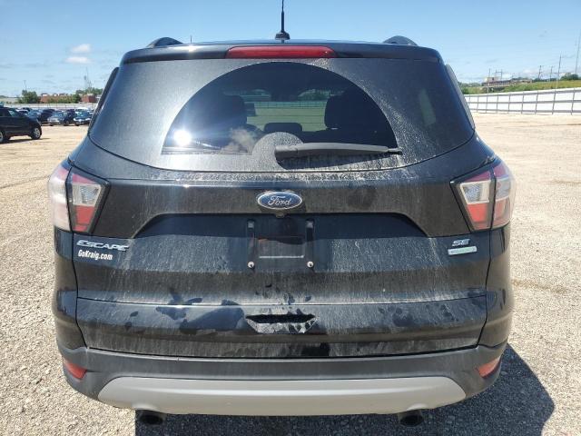Photo 6 from auction – 2018 FORD ESCAPE SE with VIN 1FMCU0GD4JUA82928