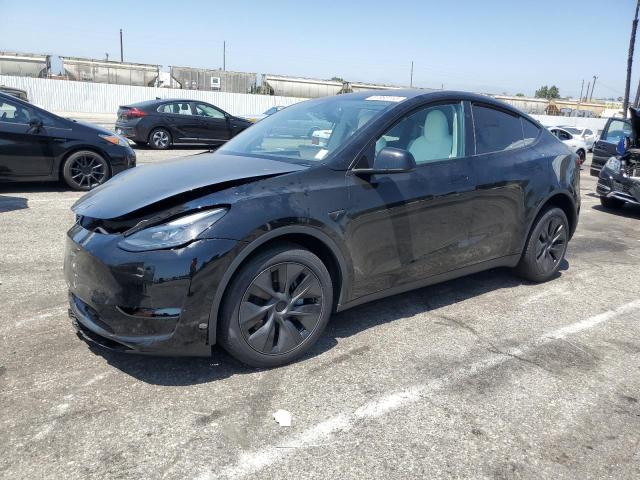 TESLA MODEL Y 2025 with VIN 7SAYGDED3SF278416 - Photo from auction