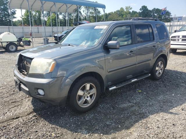 HONDA PILOT EXL 2011 with VIN 5FNYF4H50BB024604 - Photo from auction