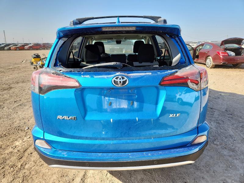 Photo 6 from auction – 2016 TOYOTA RAV4 XLE with VIN JTMWFREV0GJ090482