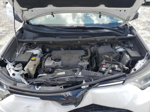 Photo 12 from auction – 2018 TOYOTA RAV4 LE with VIN 2T3ZFREV9JW485587