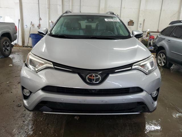 Photo 5 from auction – 2018 TOYOTA RAV4 LIMIT with VIN 2T3DFREV9JW730141