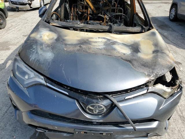 Photo 12 from auction – 2018 TOYOTA RAV4 LIMIT with VIN JTMDFREV1JD232304