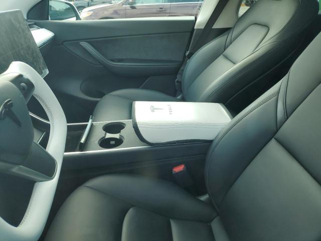 Photo 7 from auction – 2021 TESLA MODEL Y with VIN 5YJYGDED4MF103110