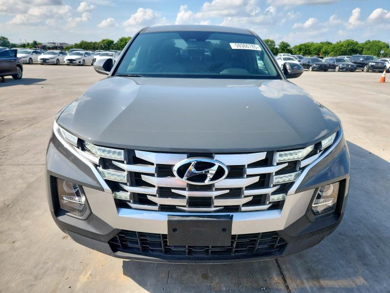 Photo 5 from auction – 2023 HYUNDAI SANTA CRUZ with VIN 5NTJBDAE1PH071111