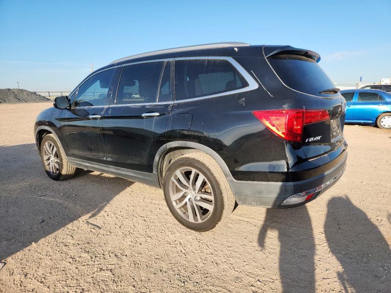 Photo 2 from auction – 2016 HONDA PILOT TOUR with VIN 5FNYF6H98GB123290