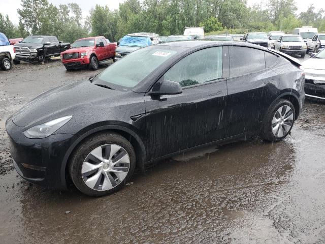 TESLA MODEL Y 2024 with VIN 7SAYGAEE7RF987299 - Photo from auction