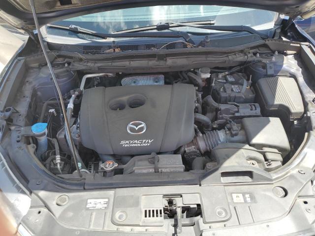 Photo 12 from auction – 2014 MAZDA CX-5 TOURI with VIN JM3KE2CY9E0334257