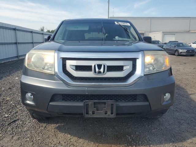 Photo 5 from auction – 2011 HONDA PILOT EXLN with VIN 5FNYF4H74BB070650