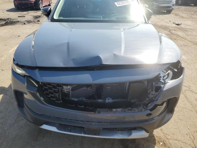 Photo 11 from auction – 2024 MAZDA CX-50 PREM with VIN 7MMVABDY7RN219147