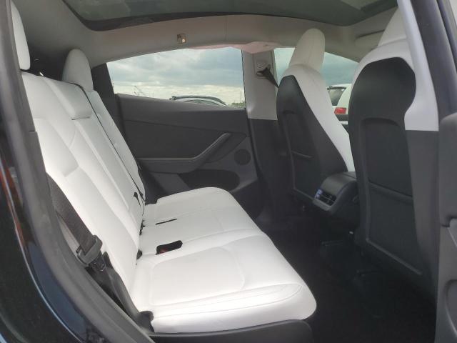Photo 10 from auction – 2023 TESLA MODEL Y with VIN 7SAYGAEE1PF931162