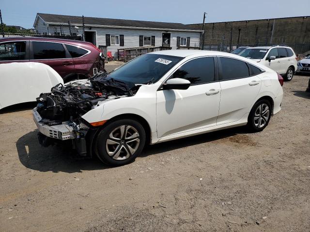 HONDA CIVIC LX 2018 with VIN 19XFC2F51JE206100 - Photo from auction