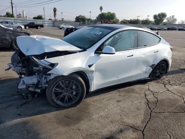 TESLA MODEL Y 2024 with VIN 7SAYGAEE5RF163284 - Photo from auction