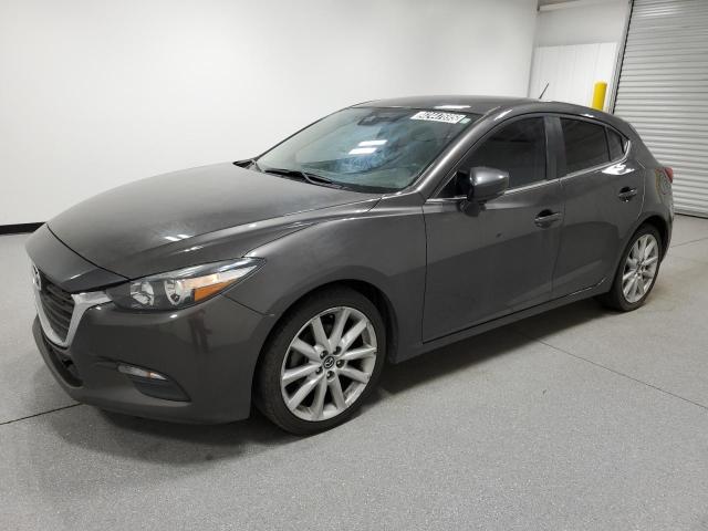 MAZDA 3 TOURING 2017 with VIN 3MZBN1L77HM137841 - Photo from auction