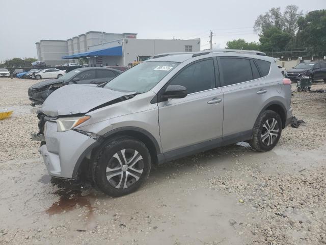 TOYOTA RAV4 LE 2018 with VIN 2T3ZFREV1JW458884 - Photo from auction