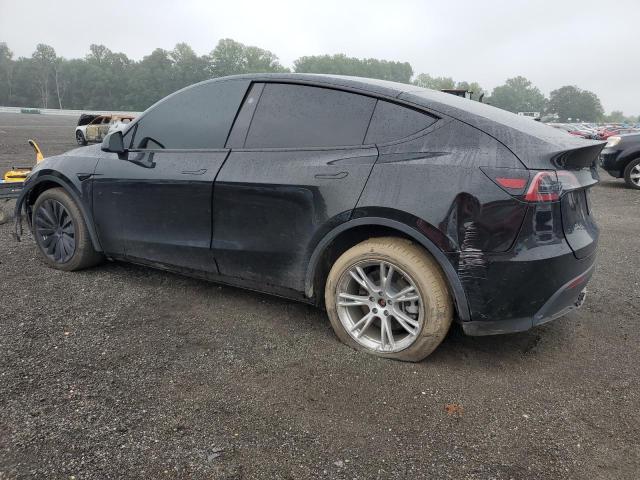 Photo 2 from auction – 2023 TESLA MODEL Y with VIN 7SAYGDEE8PA208651