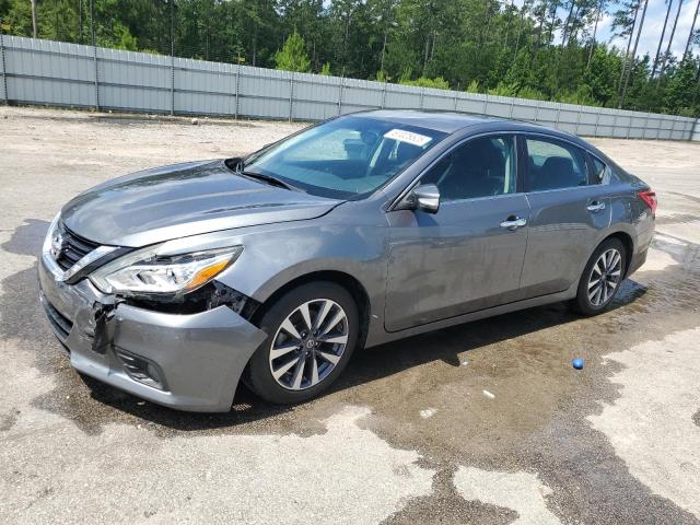 NISSAN ALTIMA 2.5 2017 with VIN 1N4AL3AP0HC205973 - Photo from auction