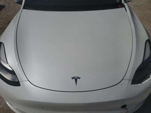 Photo 11 from auction – 2023 TESLA MODEL Y with VIN 7SAYGDEE8PF715519