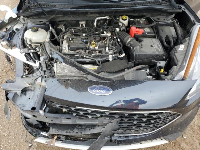 Photo 12 from auction – 2021 FORD ESCAPE SE with VIN 1FMCU9G68MUB09350