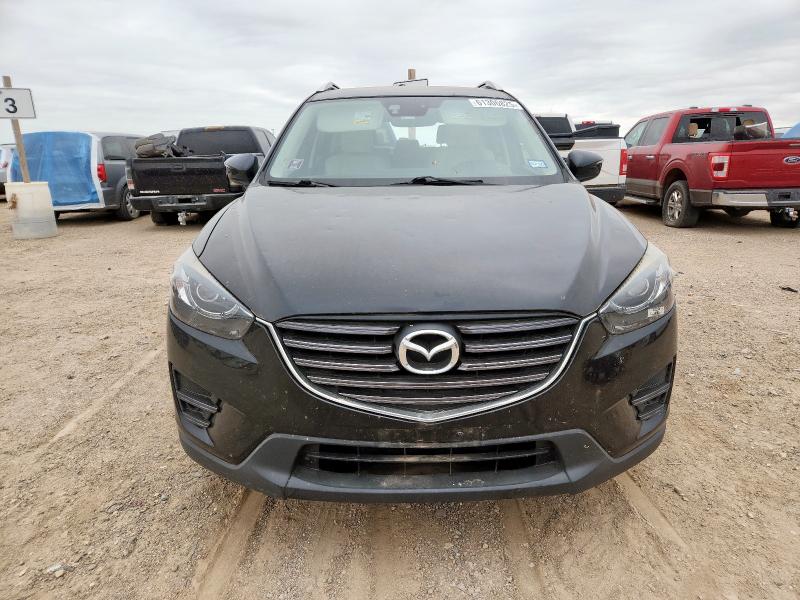 Photo 5 from auction – 2016 MAZDA CX-5 GT with VIN JM3KE2DY5G0668707